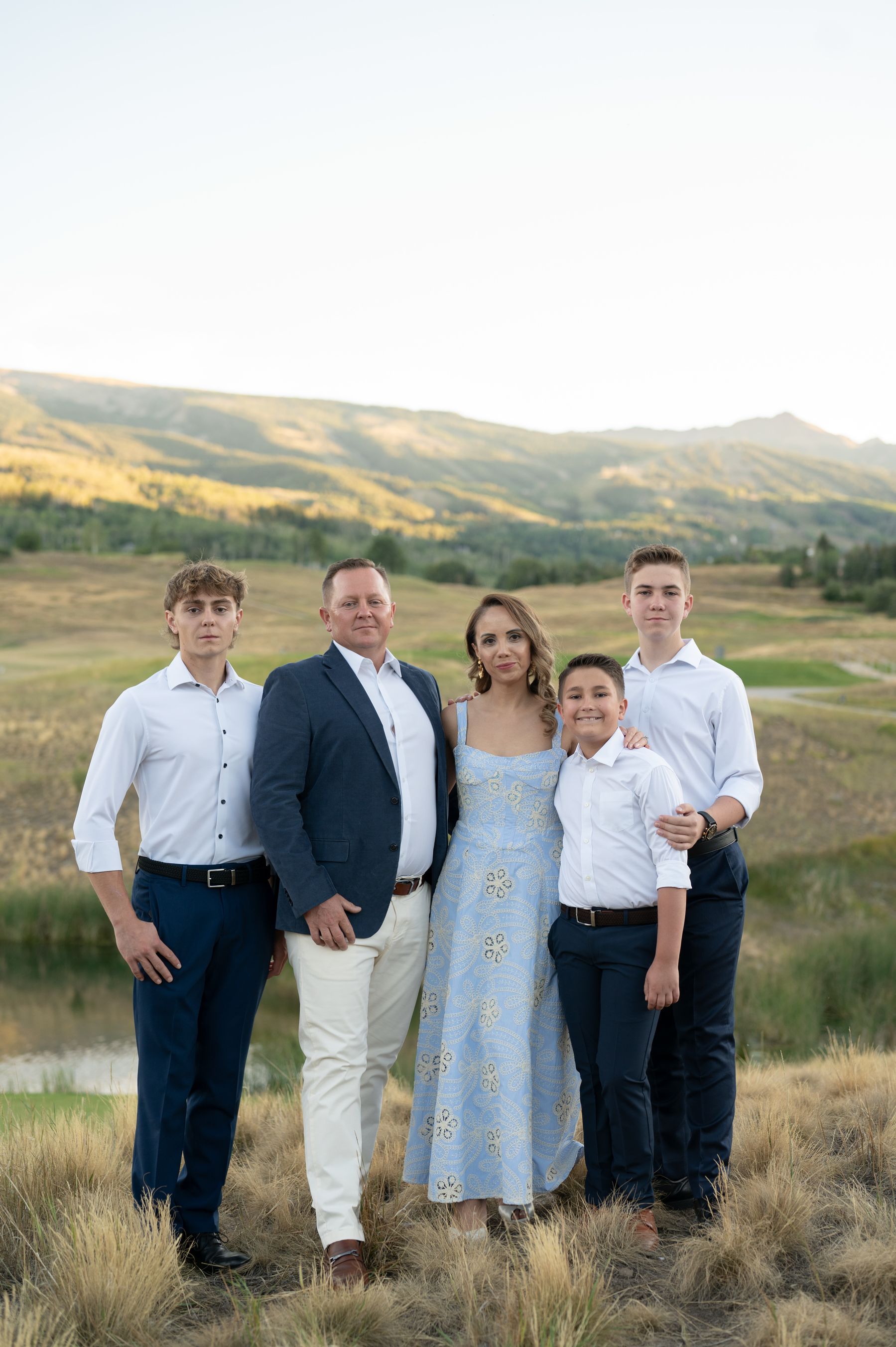 Margaret, her husband, and their three sons in the Colorado hills